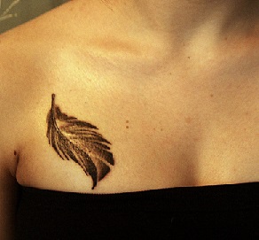 chest-tattoo-women-feather