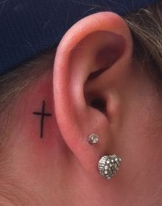 ear-tattoo-behind-cross