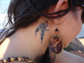 ear-tattoo-behind-feather