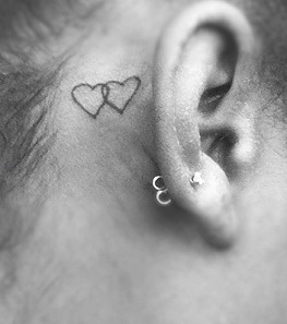 ear-tattoo-behind-hearts