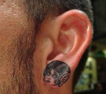 ear-tattoo-on-ear-traditional