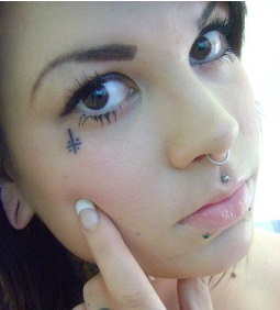 face-tattoo-small-cross