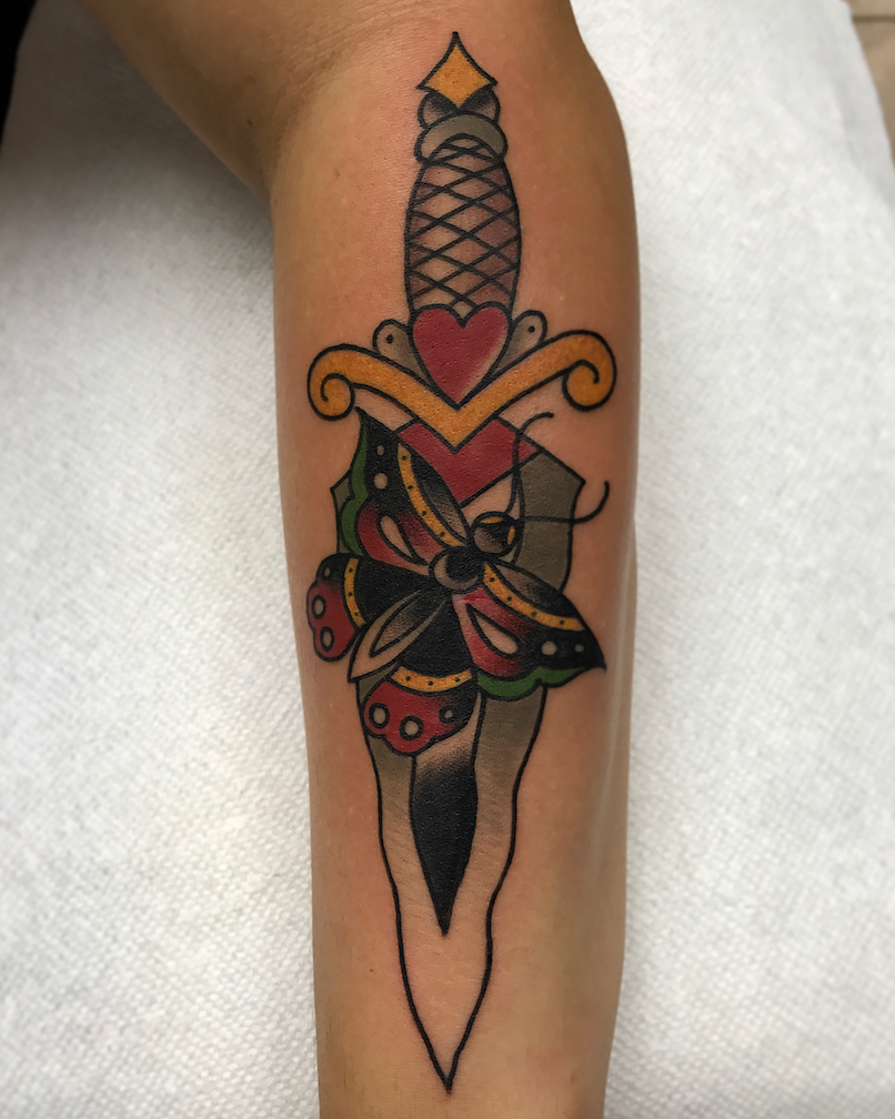 Dagger and rose tattoo by Alexandra Garcia