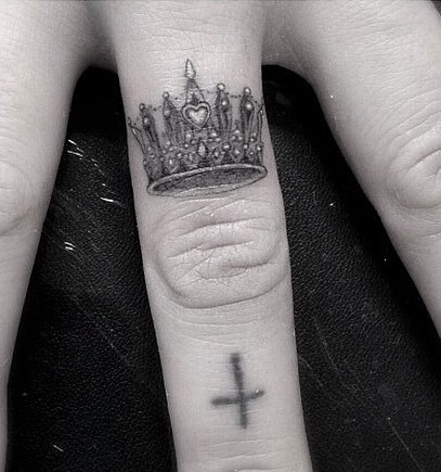 Doctor Woo small crown tattoo