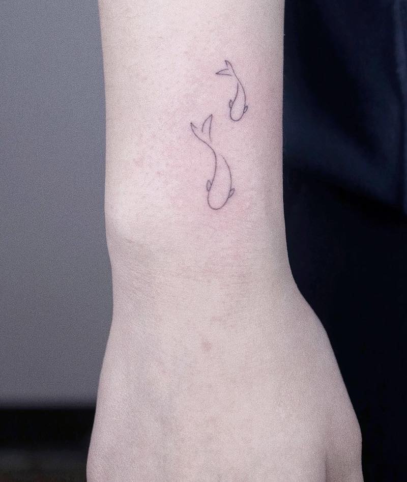 Fish Small Simple Tattoo by Arar's Tattoo