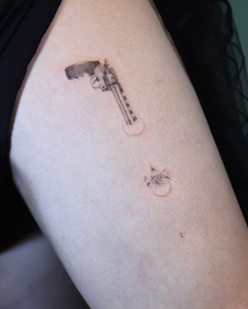 Gun Small Tattoo by Como Tattoo