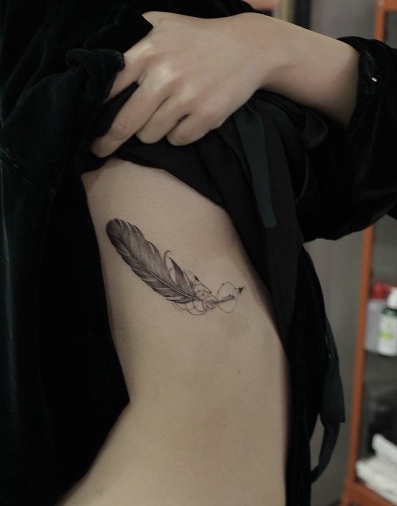 Feather Tattoo by Tattoo Shogun