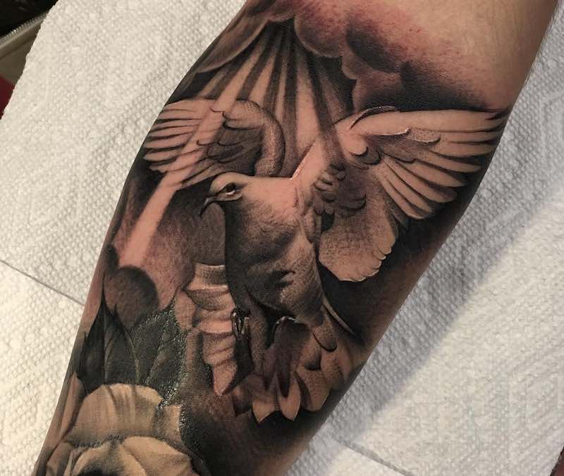 Tattoo of dove with olive branch | Joel Gordon Photography