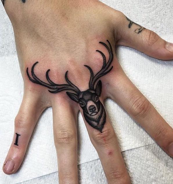Deer Middle Finger Tattoo by Jean Le Roux