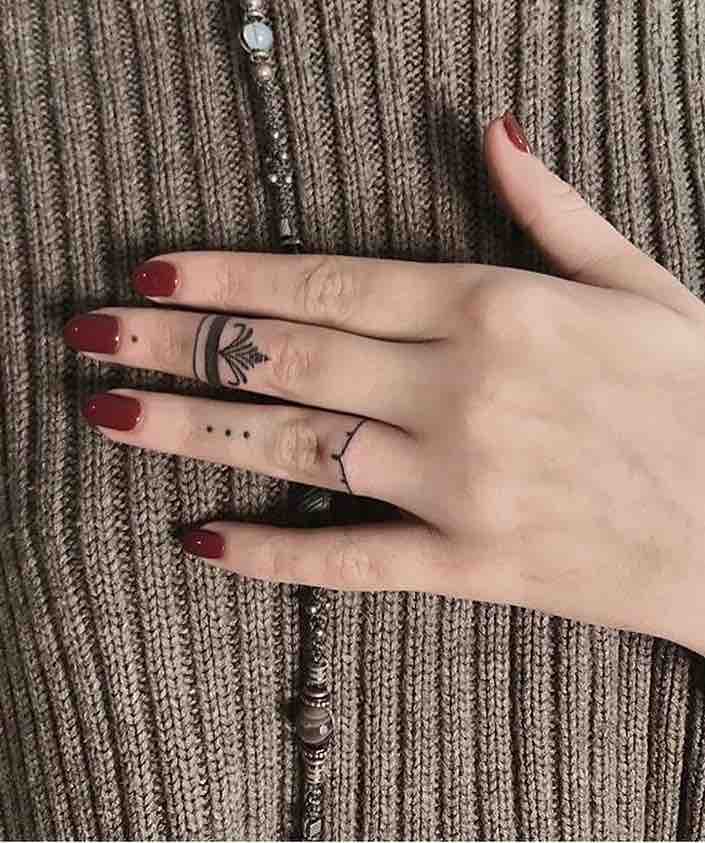 Finger Tattoo by Ann Pokes