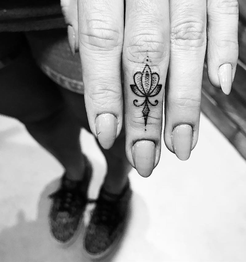 Finger Tattoo by Lucas Milk