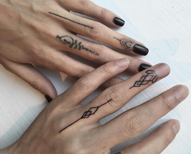 Finger Tattoos by Sasha Masiuk
