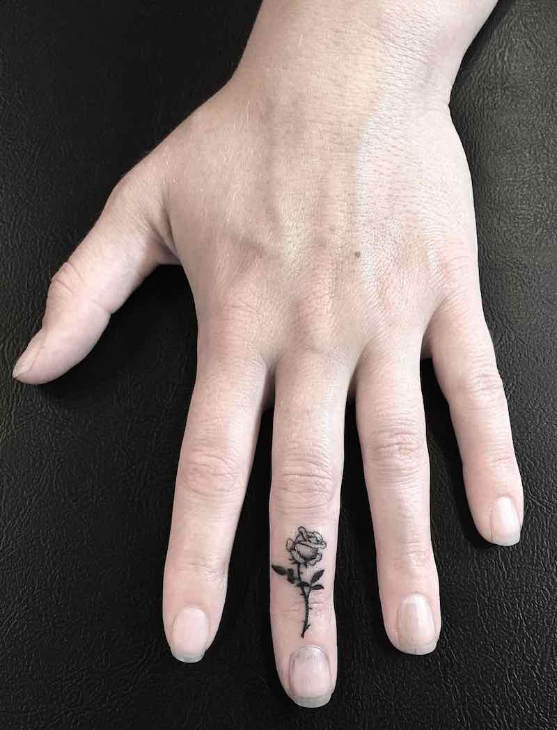Rose Finger Tattoo by Spider Sinclair