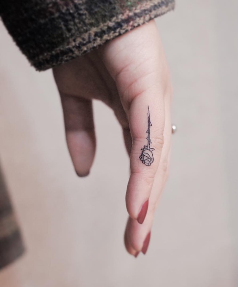 Small Rose Finger Tattoo by Witty Button