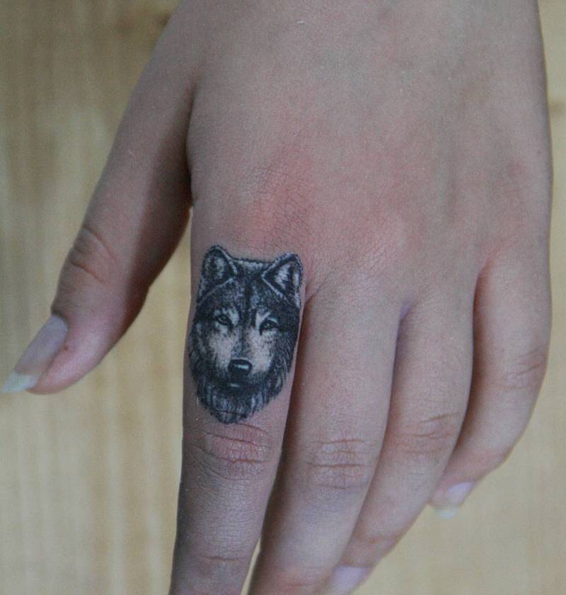 Wolf Finger Tattoo by Melek Tastekin