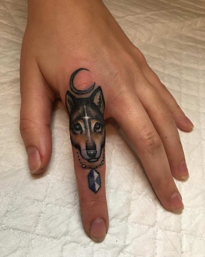 Wolf Finger Tattoo by Miryam Lumpini